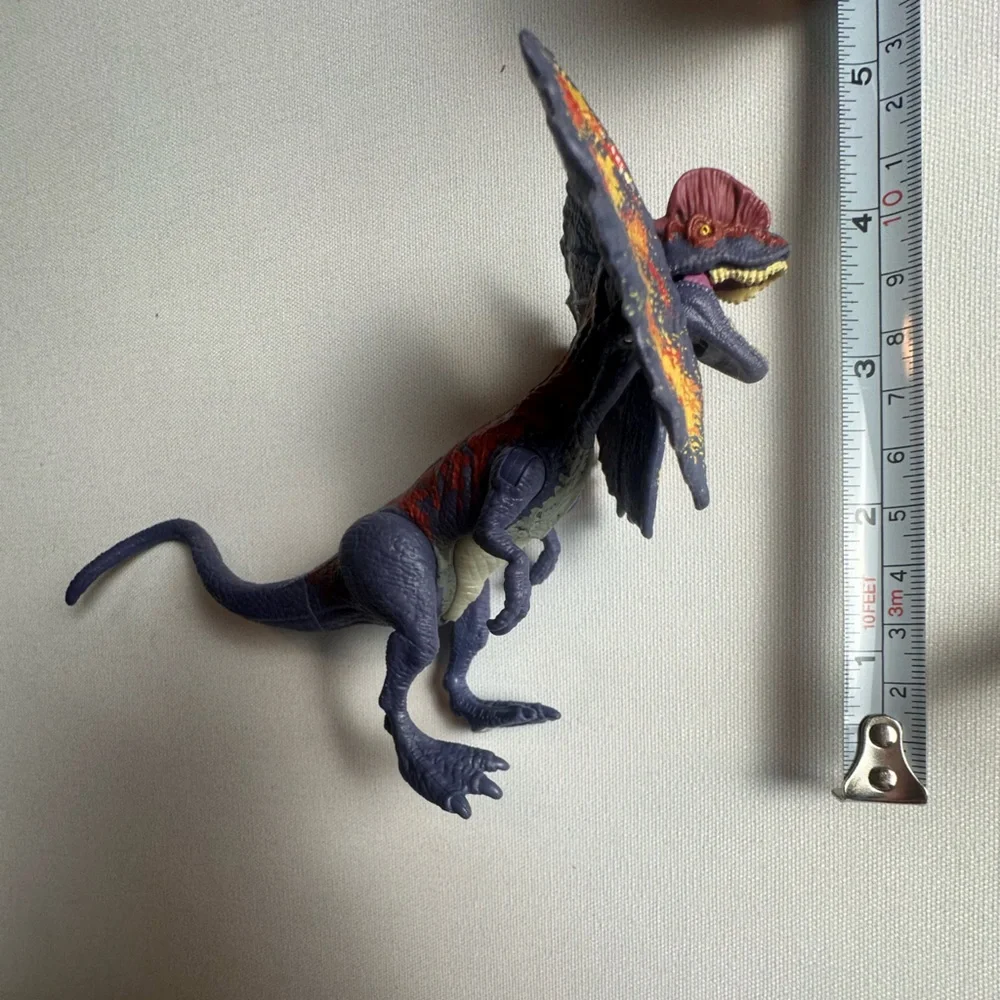 Bundle of multiple sized dinosaurs. 5 are wind up cars. See video.